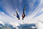 Young couple upside-down in air