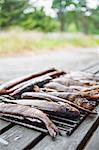 Smoked fish on metal rack