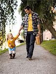 Father walking with girl