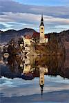 Lake Bled at dawn with Santa Maria Church (Church of Assumption), Gorenjska, Julian Alps, Slovenia, Europe