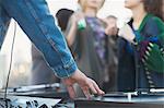 DJ spinning records at party