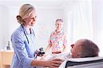 Doctor checking senior man's blood pressure in examination room