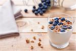 Nutritious and healthy bio yoghurt with blueberries and cereal