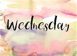 The word "Wednesday" written in black paint on a colorful watercolor washed background.