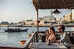 Romantic couple photographing from Dubai marina cafe, United Arab Emirates