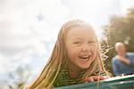 Portrait of girl looking at camera smiling