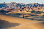 Runner sprinting in desert, Death Valley, California, USA