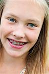 Portrait of girl (12-13) in braces smiling