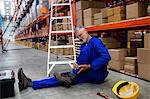 Worker lying on the floor