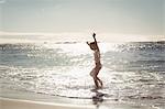 Woman playing in water