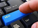 Person Click on Blue Keyboard Button with Text SEO - Search Engine Optimization. Selective Focus. Closeup View. 3D Render.