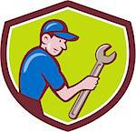 Illustration of a repairman handyman worker wearing hat carrying spanner wrench looking to the side set inside shield crest done in cartoon style.