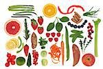 Paleolithic diet health food of fruit and vegetables over white background. High in vitamins, antioxidants, minerals and anthocyanins.