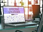 Effective Strategies Concept. Closeup Landing Page on Laptop Screen in Doodle Design Style. On Background of Comfortable Working Place in Modern Office. Blurred, Toned Image. 3D Render.