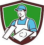 Illustration of a plasterer masonry tradesman construction worker wearing hat holding trowel viewed from front set inside shield crest done in retro style on isolated background.