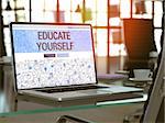 Educate Yourself - Closeup Landing Page in Doodle Design Style on Laptop Screen. On Background of Comfortable Working Place in Modern Office. Toned, Blurred Image. 3D Render.