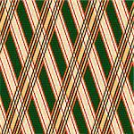 Seamless vector pattern with crossed lines mainly in orange and green hues