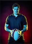 one caucasian rugby man player on colorful black background