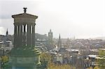 Pillars overlooking city rooftops