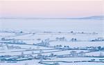 Aerial view of snowy rural landscape