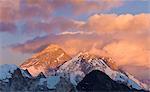 Snowy mountaintops and clouds