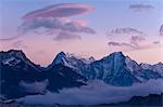 Snowy mountaintops and clouds