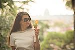 Woman enjoying an ice cream, Pincio Gardens, Villa Borghese, Rome, Italy