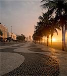 Sidewalk and palm trees, Copacabana beach at dawn, Rio De Janeiro, Brazil