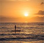 Paddleboarder, Copacabana beach at dawn, Rio De Janeiro, Brazil