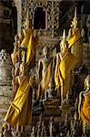 Golden statues in a buddhist temple, Luang Prabang, Laos, Southeast Asia