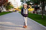 Sweden, Sodermanland, Hammarby Sjostad, Portrait of boy (6-7) in park