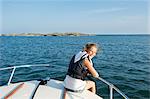 Sweden, Sodermanland, Stockholm Archipelago, Varmdo, Norsten, Portrait of girl (12-13) on boat