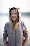 Sweden, Dalarna, Siljan, Girl (12-13) wearing bear print hoodie