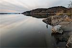 Sweden, Ostergotland, Woman looking at view at Slatbaken lake