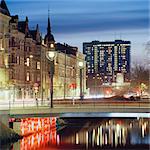 Sweden, Skane, Malmo, Illuminated bridge at dusk