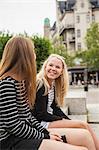 Sweden, Skane, Malmo, Two teenage girls (14-15, 16-17) sitting on steps on street