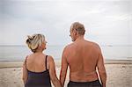 Sweden, Skane, Ahus, Senior couple on beach