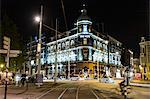 Netherlands, Amsterdam, Corner view of illuminated Park Hotel