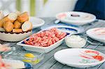 Sweden, Vastkusten, Vastra Gotalands lan, Bohuslan, Havstenssund, Set table with shrimps and bread