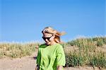 Finland, Pori, Yyteri, Smiling woman on beach at sunny day