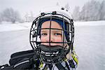 Finland, Pohjois-Pohjanmaa, Oulu, Portrait of boy (6-7) in ice hockey helmet