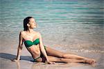 Girl sunbathing at the beach