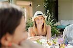 Woman enjoying meal with friends