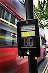 View of Speeding Bus at Crosswalk, London, England, UK