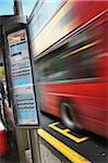 Double Decker Bus Speeding by Schedule, London, England, UK