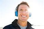 Portrait of man training, listening to headphones, El Mirage, California, USA