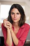 Sweden, Portrait of mid adult woman in pink blouse