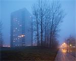 Sweden, Skane, Malmo, Hogaholm, Almvik, Residential buildings in fog