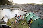 Sweden, West Coast, Bohuslan, Flato, Tent on rocky riverbank