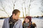 Sweden, Vasterbotten, Umea, Portrait of young couple in winter